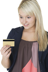 Image showing Woman looking at her credit card