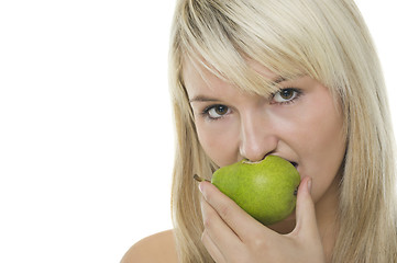 Image showing Woman with half eaten pear