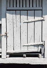 Image showing Old white wooden barn door