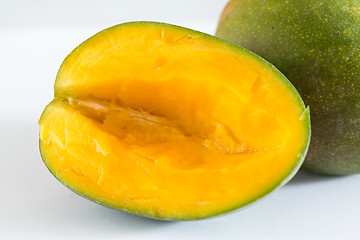 Image showing Two mangoes on white background