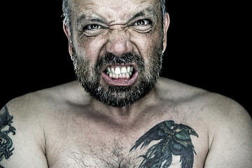 Image showing angry man with beard