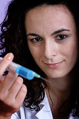 Image showing Portrait of a young doctor with syringa.