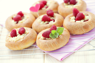 Image showing buns with raspberries