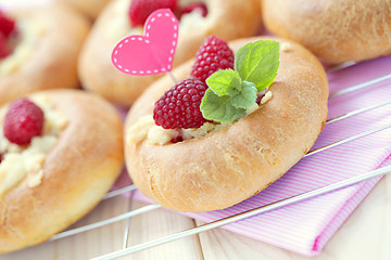 Image showing buns with raspberries