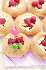 Image showing buns with raspberries