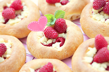 Image showing buns with raspberries