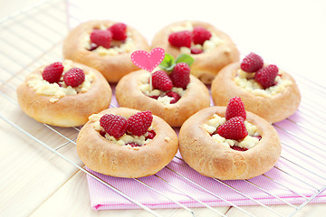 Image showing buns with raspberries