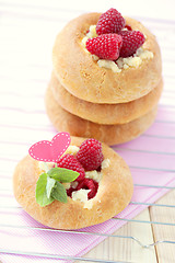 Image showing buns with raspberries