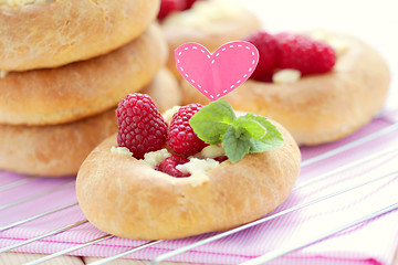 Image showing buns with raspberries