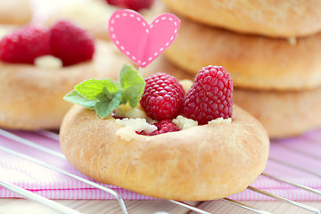 Image showing buns with raspberries