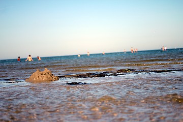 Image showing broken sandcastle at the beach