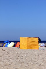 Image showing different sun protection gear at the beach