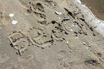 Image showing beach sand text