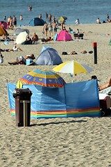 Image showing different sun protection gear at the beach