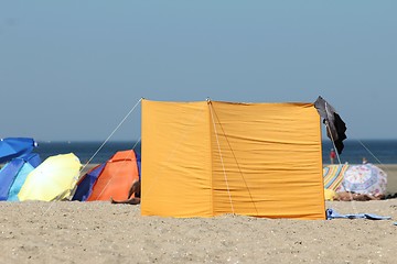 Image showing different sun protection gear at the beach