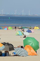 Image showing different sun protection gear at the beach