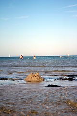 Image showing broken sandcastle at the beach