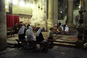 Image showing Nuns praying in the Church of the Holy Sepulchre