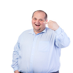 Image showing Fat Man in a Blue Shirt, Showing Obscene Gestures