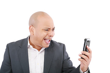 Image showing Angry business man screaming on cell mobile phone, portrait of y