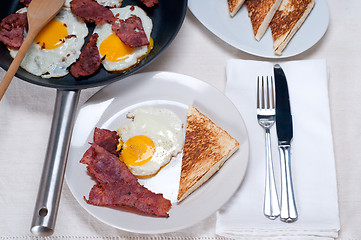 Image showing eggs bacon and toast bread