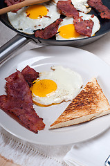 Image showing eggs bacon and toast bread