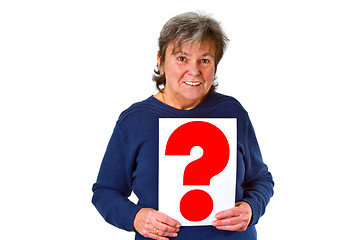 Image showing Female senior holding question mark