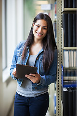 Image showing Hispanic college student using tablet PC