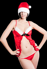 Image showing Beautiful and sexy christmas woman with sweets