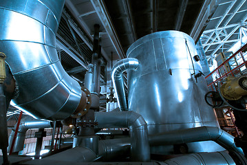 Image showing industrial ladders, cables, pipelines in blue tones