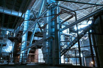 Image showing industrial ladders, cables, pipelines in blue tones