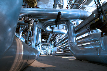 Image showing industrial ladders, cables, pipelines in blue tones