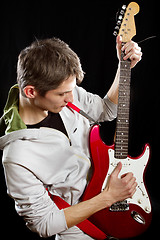 Image showing Man With The Guitar