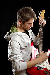 Image showing Man With The Guitar