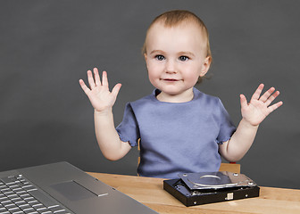 Image showing child with open hard drive