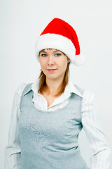 Image showing Attractive young girl in santa hat