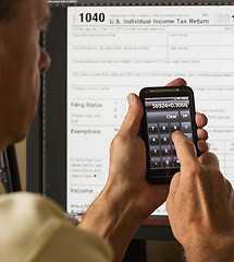 Image showing USA tax form 1040 for year 2012 and calculator