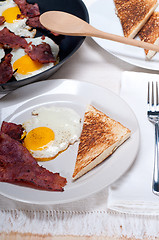 Image showing eggs bacon and toast bread