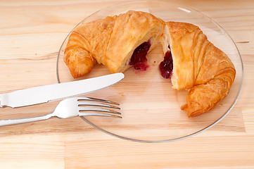 Image showing croissant French brioche filled with berries jam