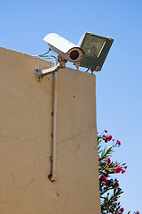 Image showing Video camera of system of supervision on a building wall 