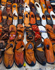 Image showing Shoes for sale on a tunisian street 