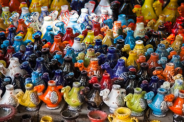 Image showing Tunisian candle holder, camel shape at the Market