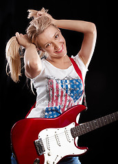 Image showing Woman Playing the Guitar