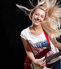 Image showing Woman Playing the Guitar