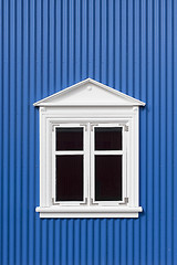 Image showing Blue wall with window