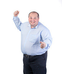 Image showing Happy Fat Man in a Blue Shirt