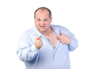 Image showing Fat Man in a Blue Shirt, Showing Obscene Gestures