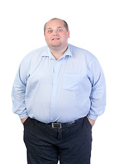 Image showing Fat Man in a Blue Shirt, Contorts Antics