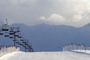 Image showing Snow skiing piste and ropeway