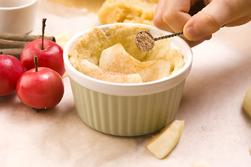 Image showing Detail of child hands making apple pie